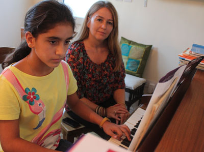 learning piano with Nona Macpherson